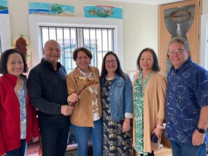 Pictured left to right is Mary S. SanAgustin, Treasurer, Jeff Macaraeg, President. Senator Telo Taitague, Janice Waller Bouffiou, Secretary, lou Barrett, liason for Wash DC, Nd Philip Gogue, Vice President.